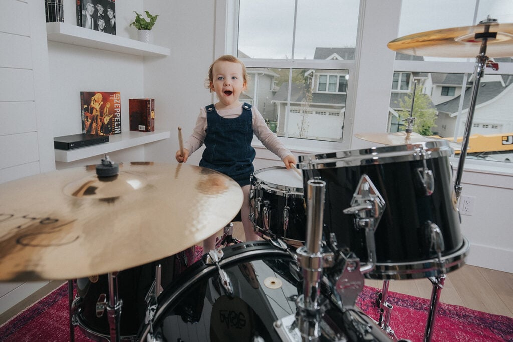 The Best Drum Sets For Kids (2024) 1 little girl playing drums