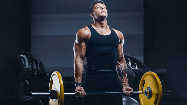 Image of a man doing a bicep curl exercise