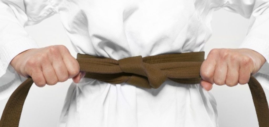 Image of a yellow Karate belt representing one of the karate belt colors and ranking system