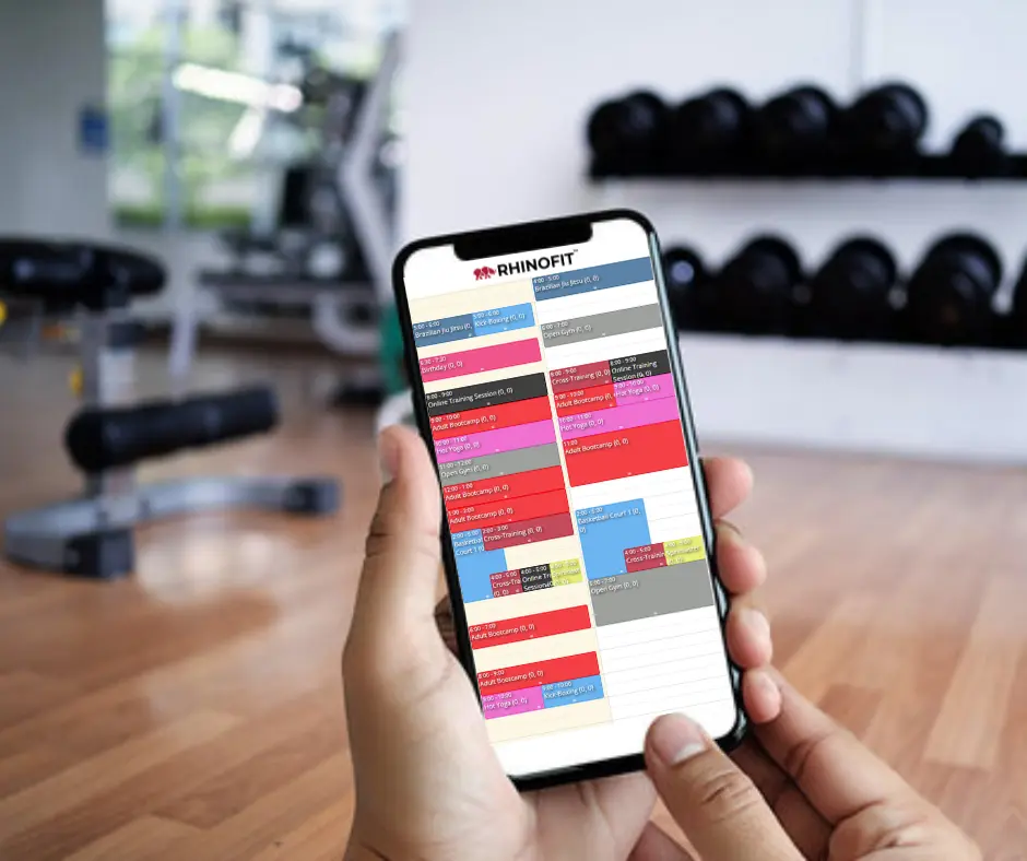 Image displaying RhinoFit class scheduling, calendar, and booking app