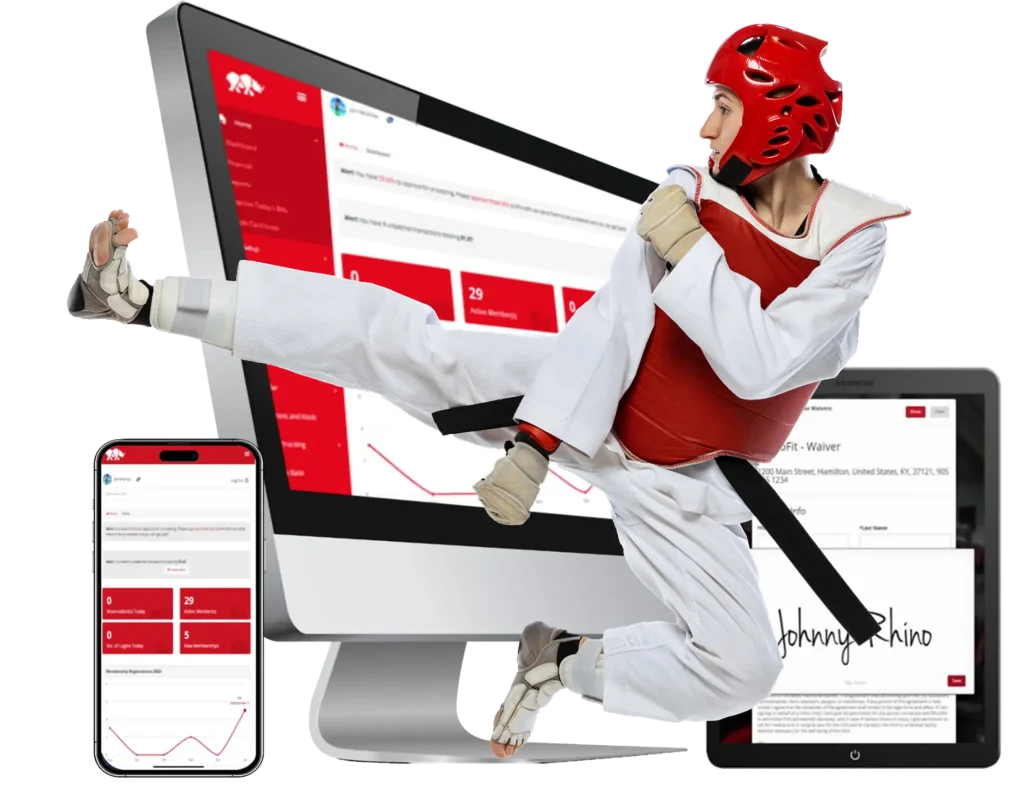 Image of a young boy practicing martial arts with RhinoFIt's martial arts software system in the background