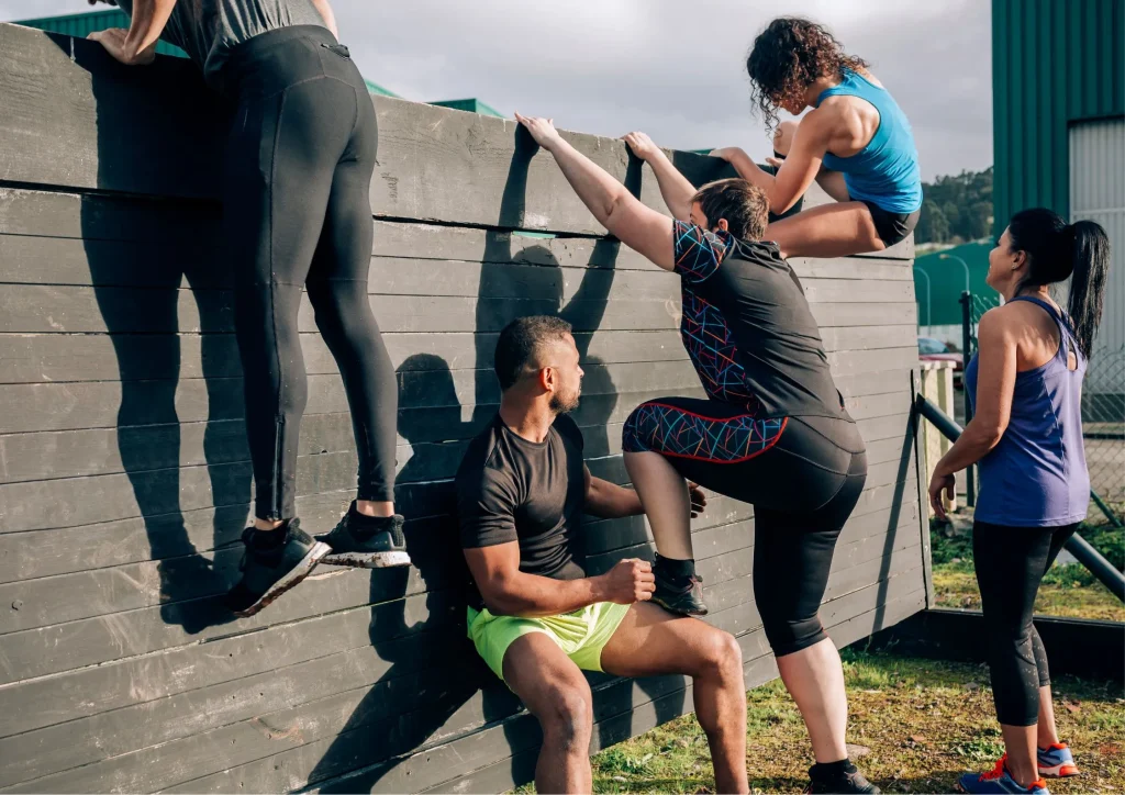 Image of the fitness community competing in an obstacle course challenge