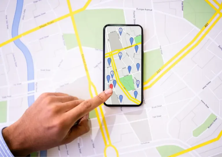 Image of someone determining local seo on a mobile map