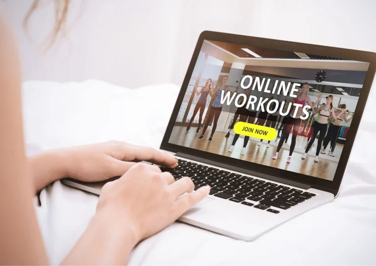 Image of a woman joining an online workout from a landing page